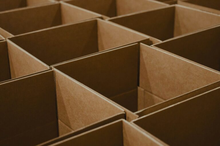 Rows of open, empty cardboard shipping boxes ready for packing