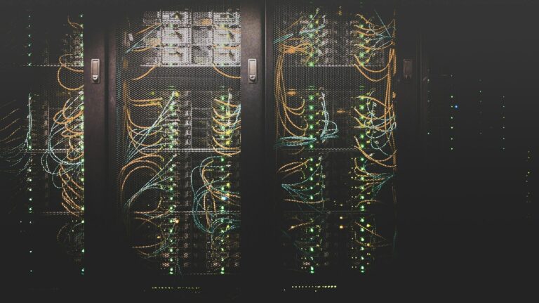 Server racks with colored cables and status lights